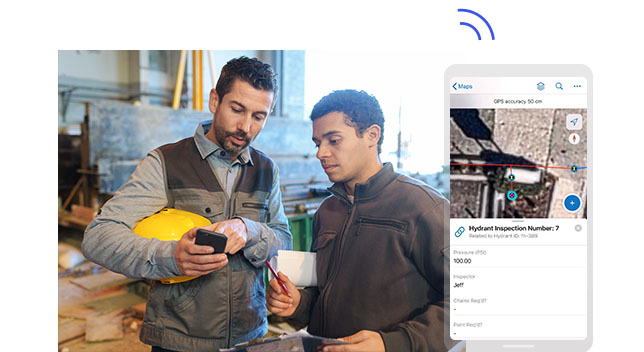 Two fieldworkers looking at a mobile phone and a screenshot of the screen showing the hydrant inspection number and its location